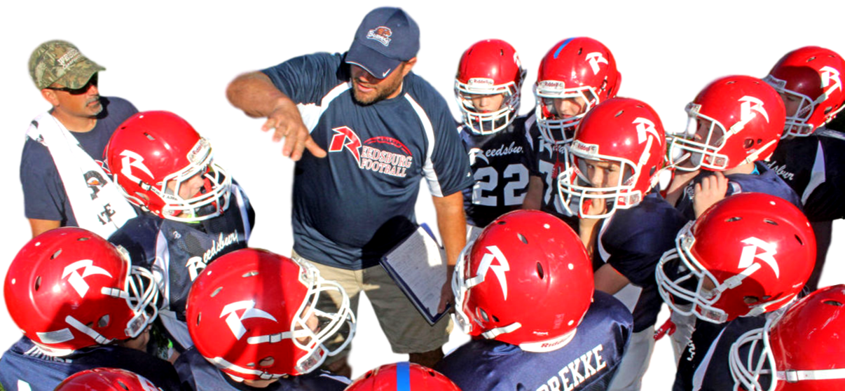 Football coach working with youth players
