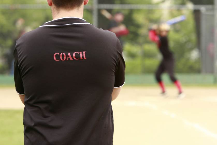 Trusted Coaches certified coach watching a youth baseball game